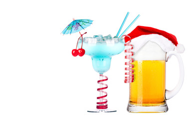 Beer with hat of Santa Claus and cocktail