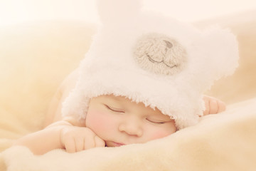 Newborn baby in bear hat