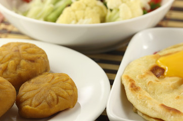 Parotta with barfi and vegetables