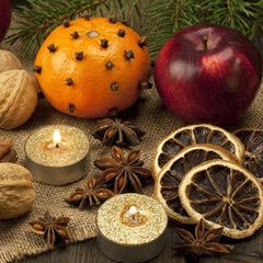 Holiday still life of spices  with freshly cut fir tree branches