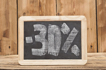 thirty percent written on blackboard