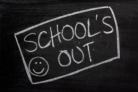 School's Out written on a used Blackboard