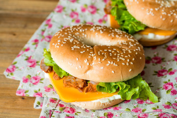 Bagel with fresh cheese and fresh lettuce