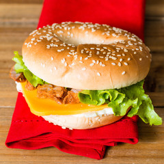 Bagel with fresh cheese and fresh lettuce
