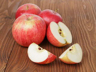 gala apples on wood table