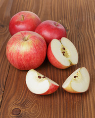 gala apples on wood table