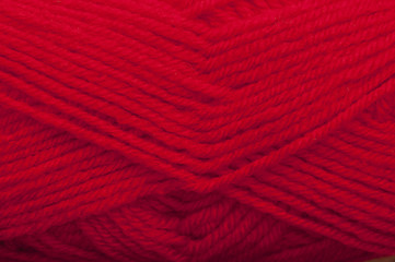 Red woolen thread closeup