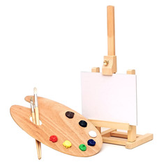 Photo of an artists easel with a blank canvas plus palette of pa