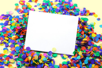 Scattered confetti, background with copy space.