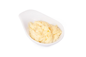 creamy sauce in a white bowl