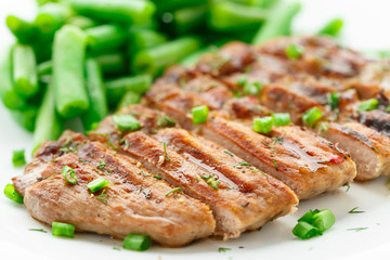 Beef steak with green beans