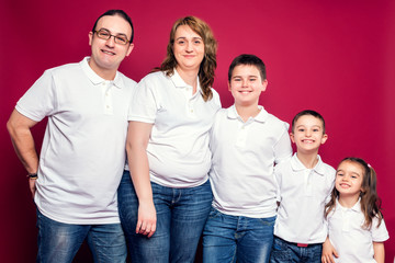 Five Member Family Smiling
