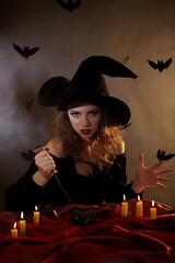 Fototapeta premium Halloween witch on dark background