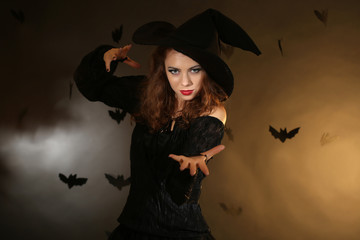 Halloween witch on dark background