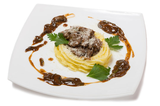 Fried beef fillet with mushrooms and mashed potato