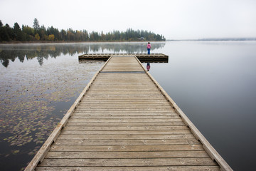 Child on end of the dock.
