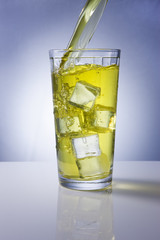 Pouring refreshing beverage.
