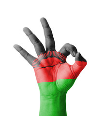 Hand making Ok sign, Malawi flag painted