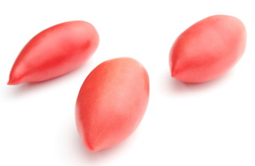 Three fresh tomatoes on white background