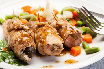 Beef rolls and vegetables