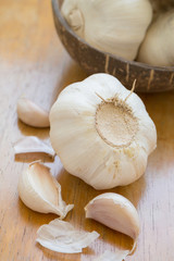 Garlics on wooden table
