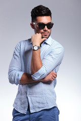 Obraz premium pensive casual man looks away