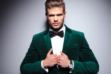 smiling young man in an elegant velvet suit