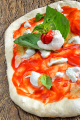 raw pizzas