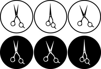 set of professional scissors in round frame
