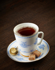 tea cup and brown sugar cubes