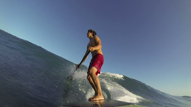 POV Stand Up Paddle Surfing Blue Wave