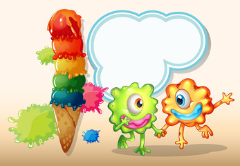 Two monsters holding their hands near the giant icecream
