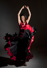 Young woman dancing flamenco