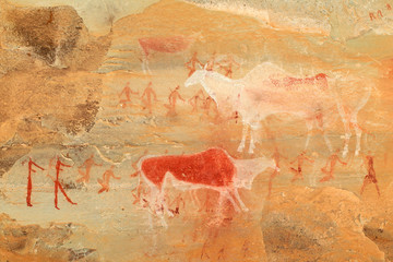 Bushmen rock painting depicting antelopes and human figures