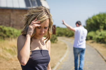 Unhappy man and angry woman leaving after quarrel