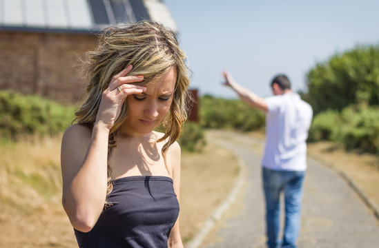 Unhappy Man And Angry Woman Leaving After Quarrel