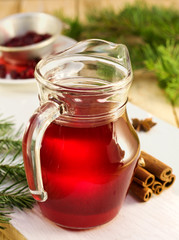 cranberry drink in a glass pitcher