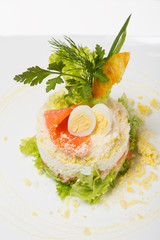 Salad with smoked trout and boiled scallop.