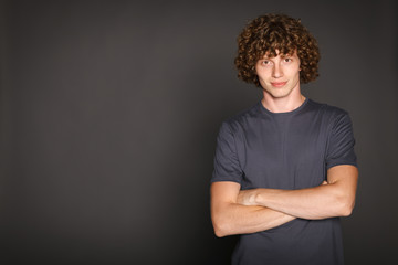 Redheaded man in casual with folded hands