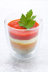 appetizer of mashed colored peppers with goat cheese in glass