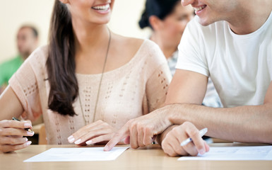 students discussing work