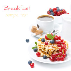 breakfast with Belgian waffles, berries, freshly brewed coffee