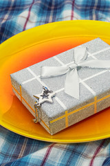 light cardboard gift box with a surprise inside