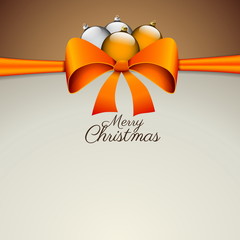Christmas card with shiny ribbon bow and four balls