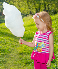 Girl holding cotton candy