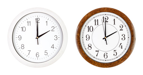 Two clock faces showing two o'clock