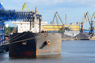 Cargo ship loading in the port of Ventspils