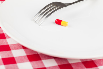 Pill on a plate