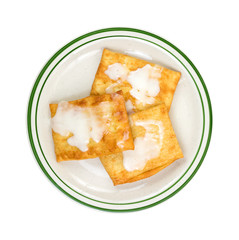 Three toaster pastries on a plate