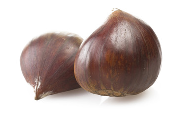 Fototapeta premium chestnuts group close up on the white